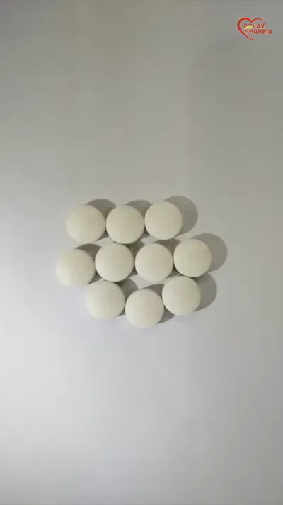 White film coated round tablets