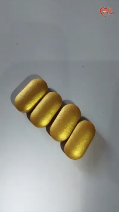 Metallic gold non-aqueous film coated caplets